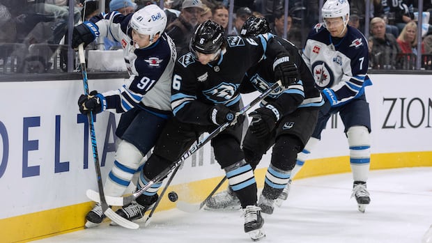 Jets snare 1 point, but their winless streak reaches 4 after 4-3 setback in Utah