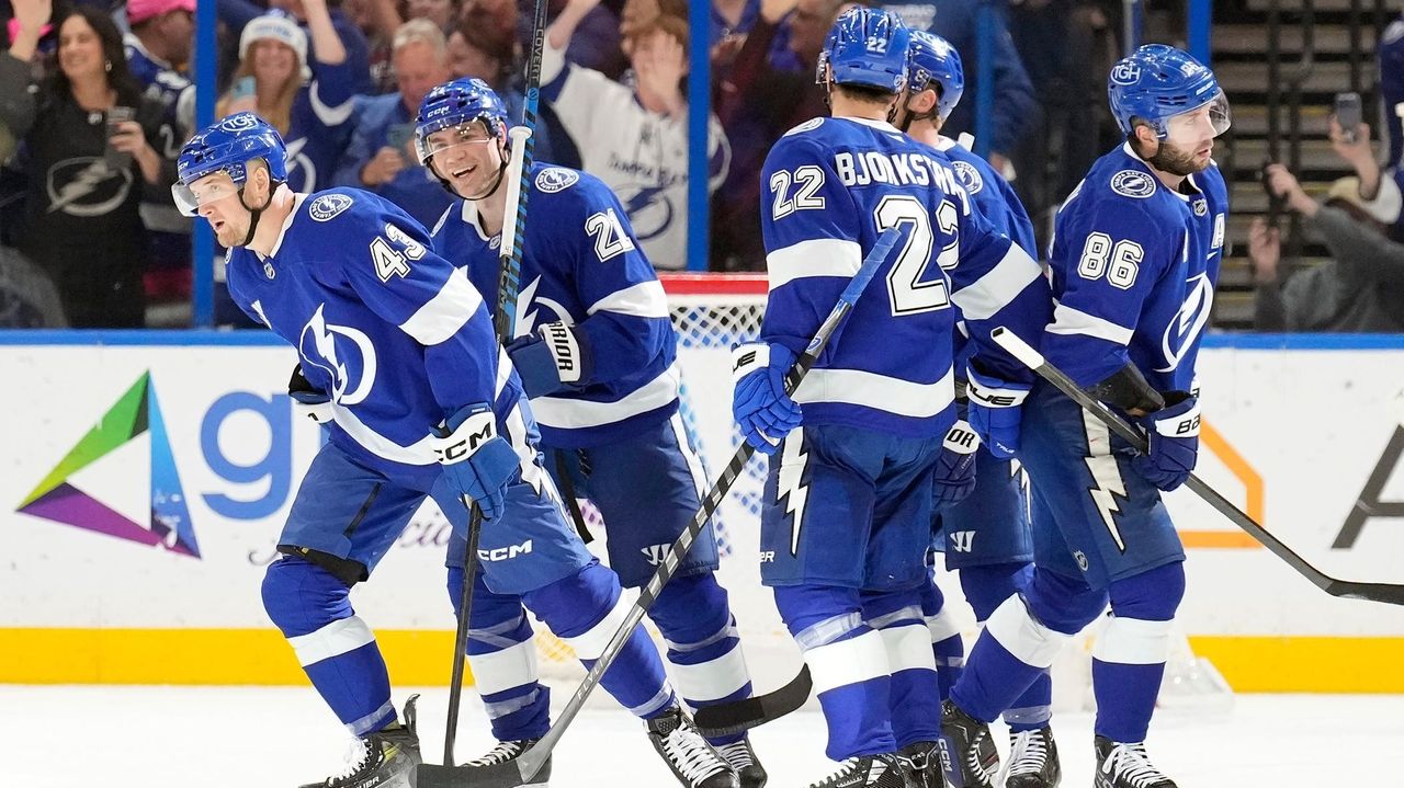 Raddysh has goal, 2 assists to reach 100 career points as Lightning beat Blues 4-1