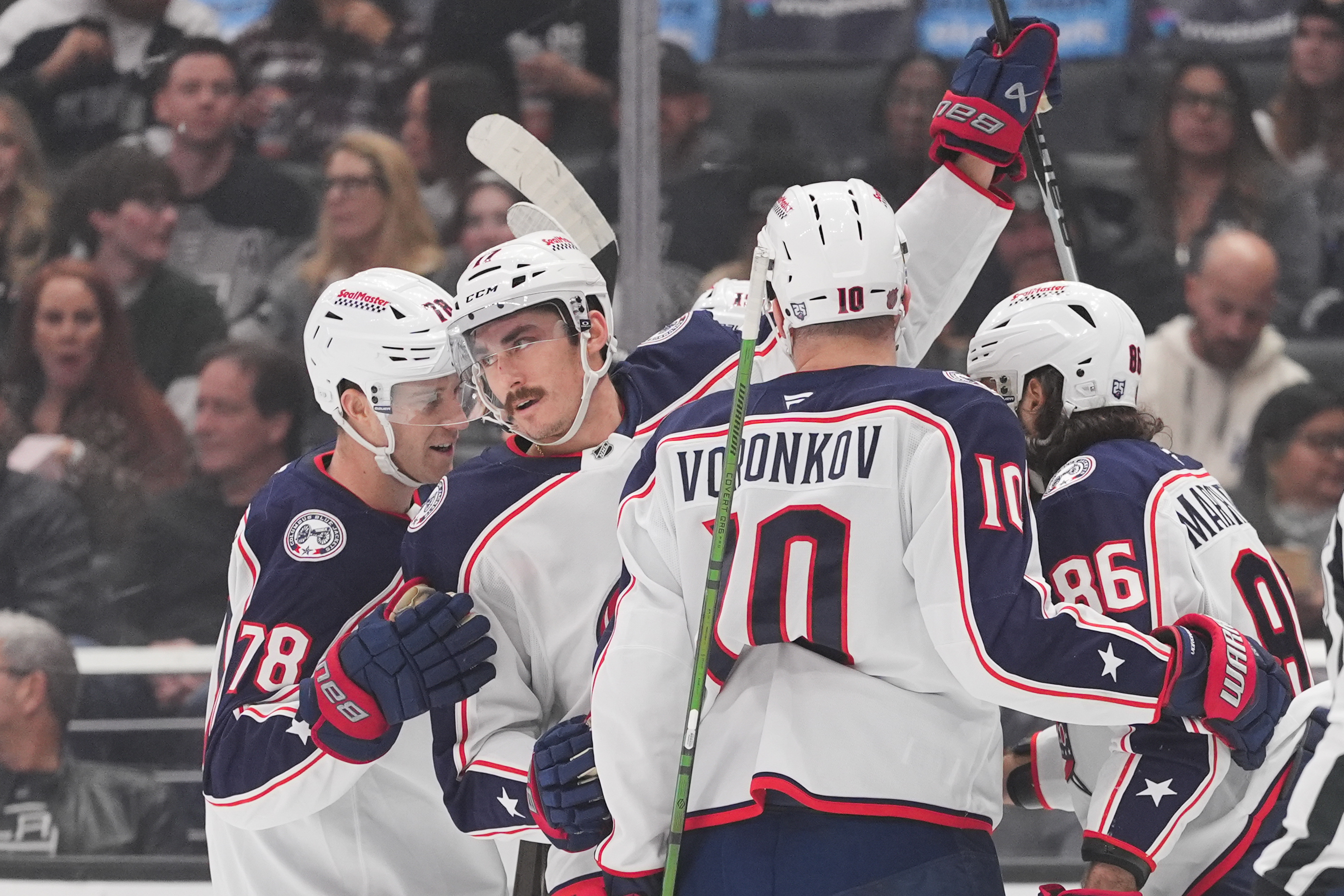 The Columbus Blue Jackets’ Mason Marchment (17) celebrates his goal...