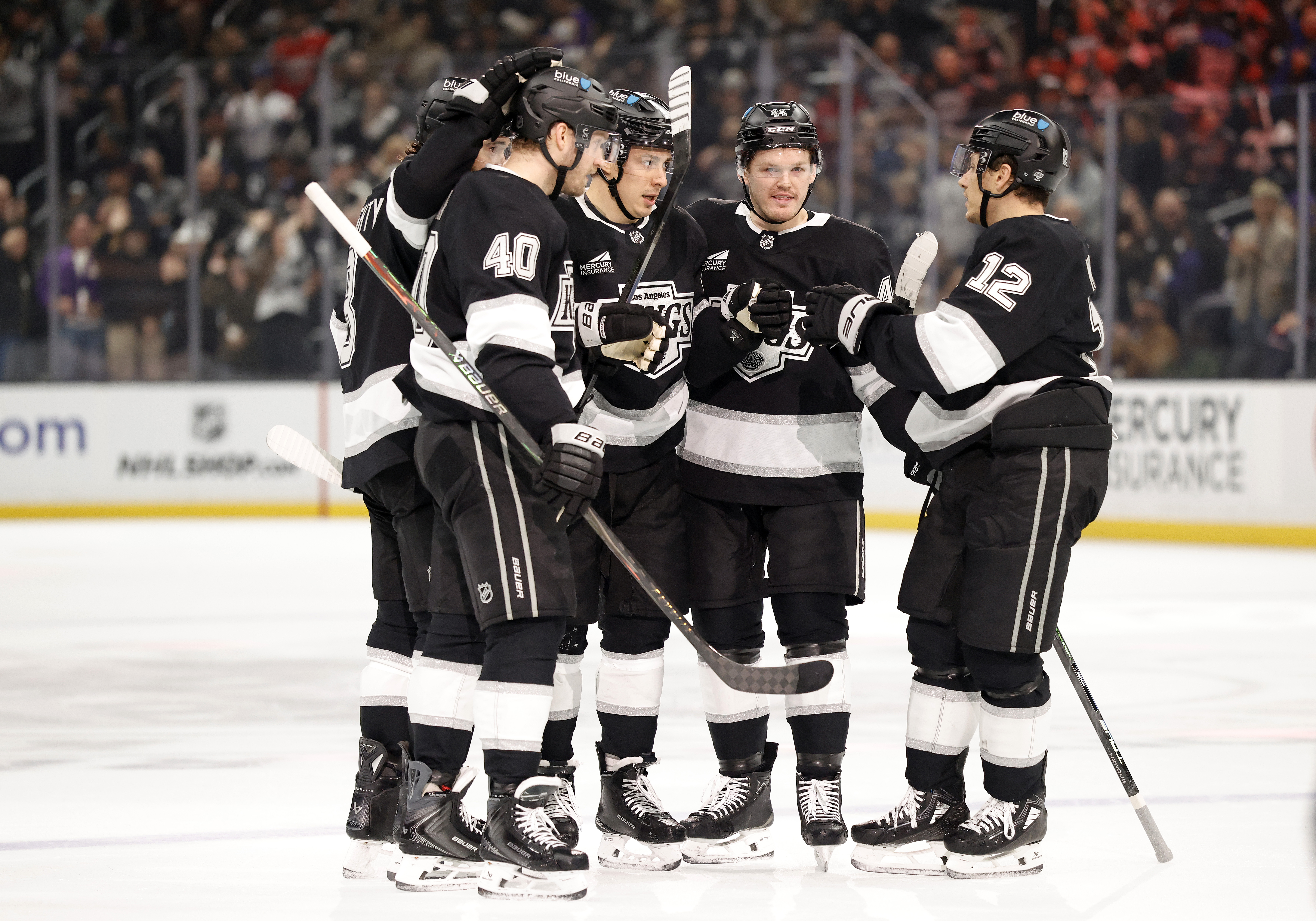 Kings players celebrate a goal during the second period of...