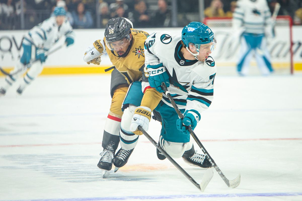 Vegas Golden Knights F Keegan Kolesar (55) fights for the puck against San Jose Sharks F William Eklund (72) on Tuesday December 23, 2025, in Las Vegas, Nevada. 