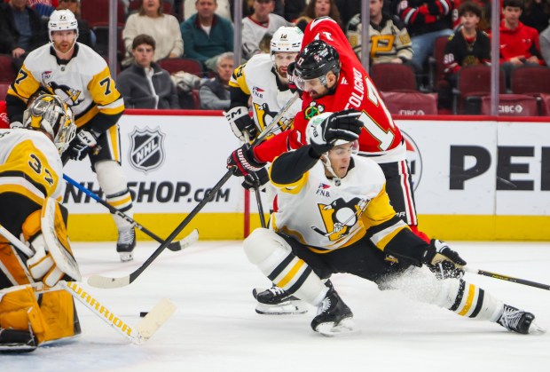 Blackhawks left wing Nick Foligno (17) shoots on goal during the third period against the Pittsburgh Penguins, Dec. 28, 2025, at the United Center. (Dominic Di Palermo/Chicago Tribune)