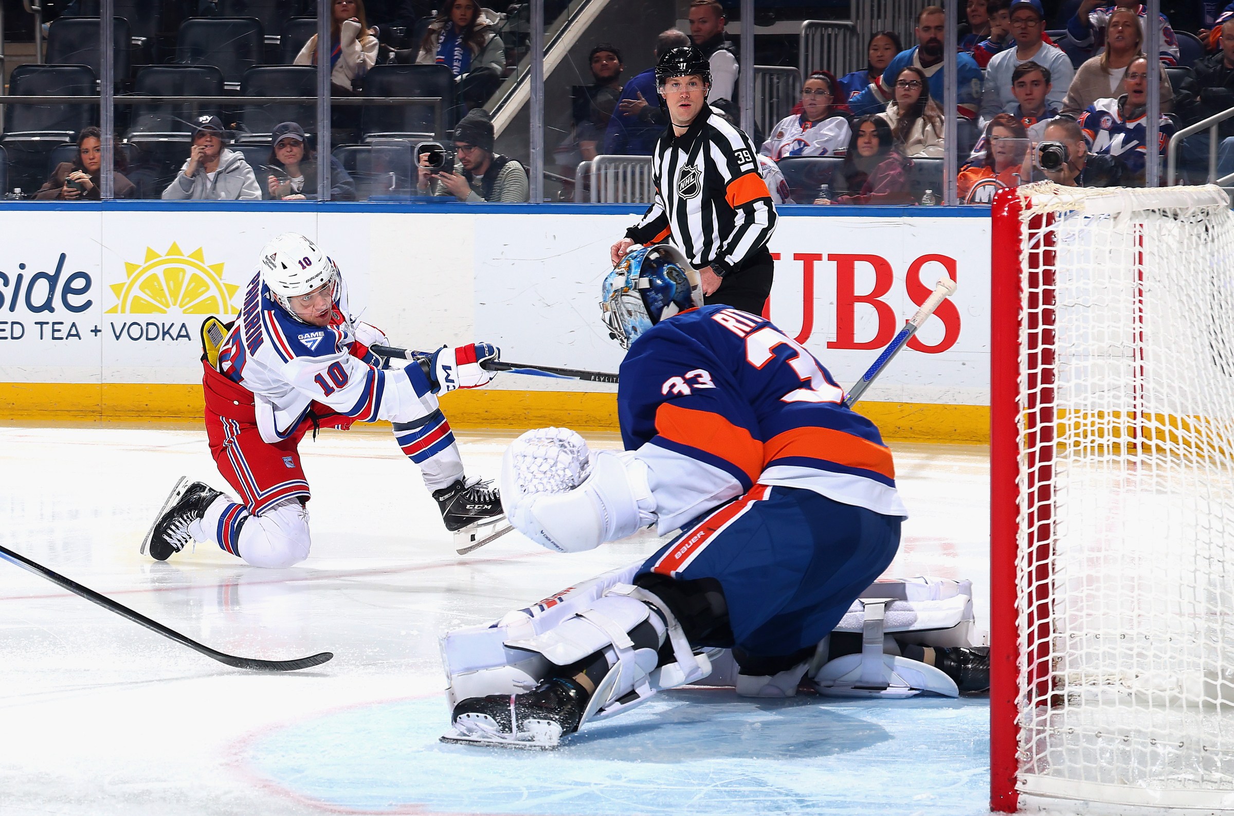 ELMONT, NEW YORK - DECEMBER 27: Artemi Panarin #10 of the New York Rangers misses a third period shot against David Rittich #33 of the New York Islanders at UBS Arena on December 27, 2025 in Elmont, New York. (Photo by Bruce Bennett/Getty Images)