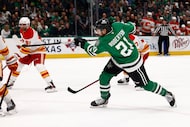 Dallas Stars left wing Jason Robertson (21) scores a goal during the third period of an NHL...