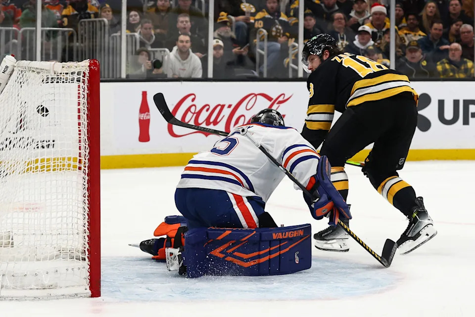 Boston Bruins center Pavel Zacha (18) scores on Edmonton Oilers goaltender Tristan Jarry (35) during the first period at TD Garden.Winslow Townson-Imagn Images