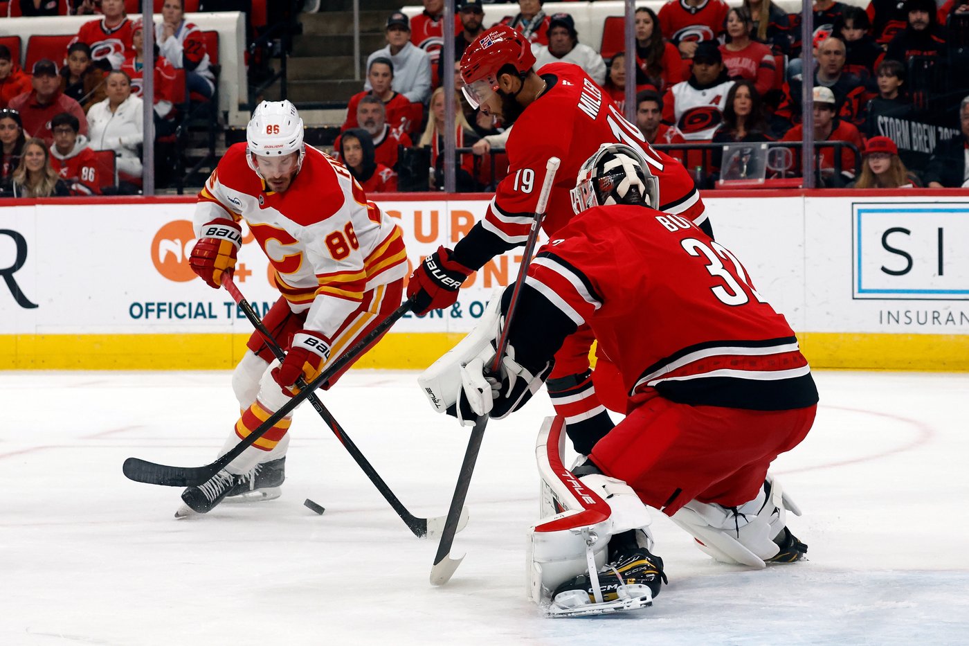 Bussi makes 15 saves for 1st NHL shutout, Ehlers scores in OT in Hurricanes' 1-0 win over Flames