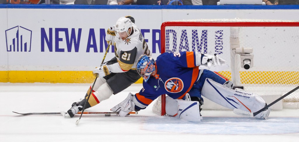 New York Islanders goaltender Ilya Sorokin (30) trips Vegas Golden Knights center Brett Howden (21) during the first period when the New York Islanders played the Tuesday, December 9, 2025 at UBS Arena in Elmont, NY. 