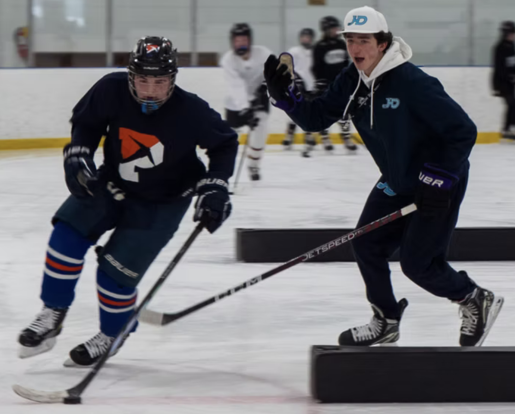 Bryan Jones, right, is opening a hockey training facility at 2150 state Highway 420 in the town of Massena.  Photo courtesy Jones Hockey Development.