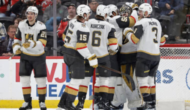 Vegas Golden Knights goaltender Akira Schmid, second from right, is congratulated by teammates ...