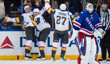 Vegas Golden Knights players celebrate after winning an NHL hockey game in overtime against the ...