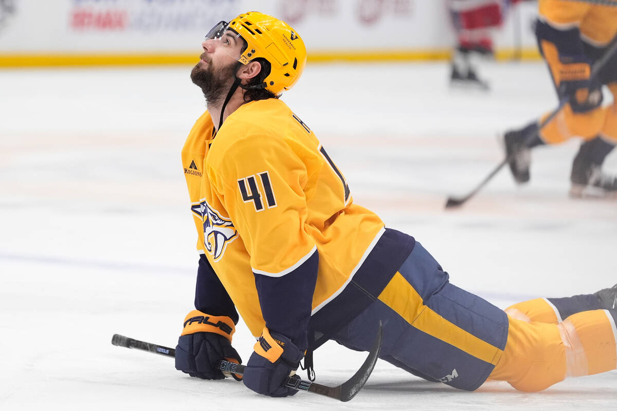 Nashville Predators defenseman Nicolas Hague (41) warms up before an NHL hockey game against th ...
