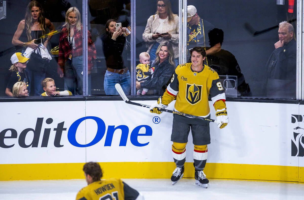 Golden Knights right wing Mitch Marner (93) with his wife Stephanie and their son Miles as he s ...
