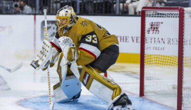 Golden Knights goaltender Adin Hill (33) is showered in ice as he defends the net against the U ...
