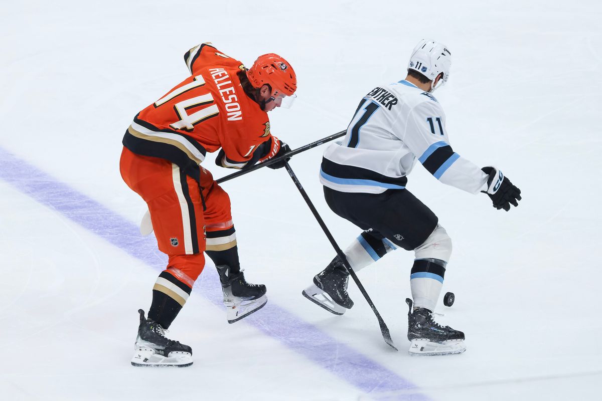 Anaheim Ducks defenseman Drew Helleson (14) steals the puck during the NHL game against the Utah Mammoth, Wednesday December 3rd, 2025 at the Honda Center in Anaheim, Calif.