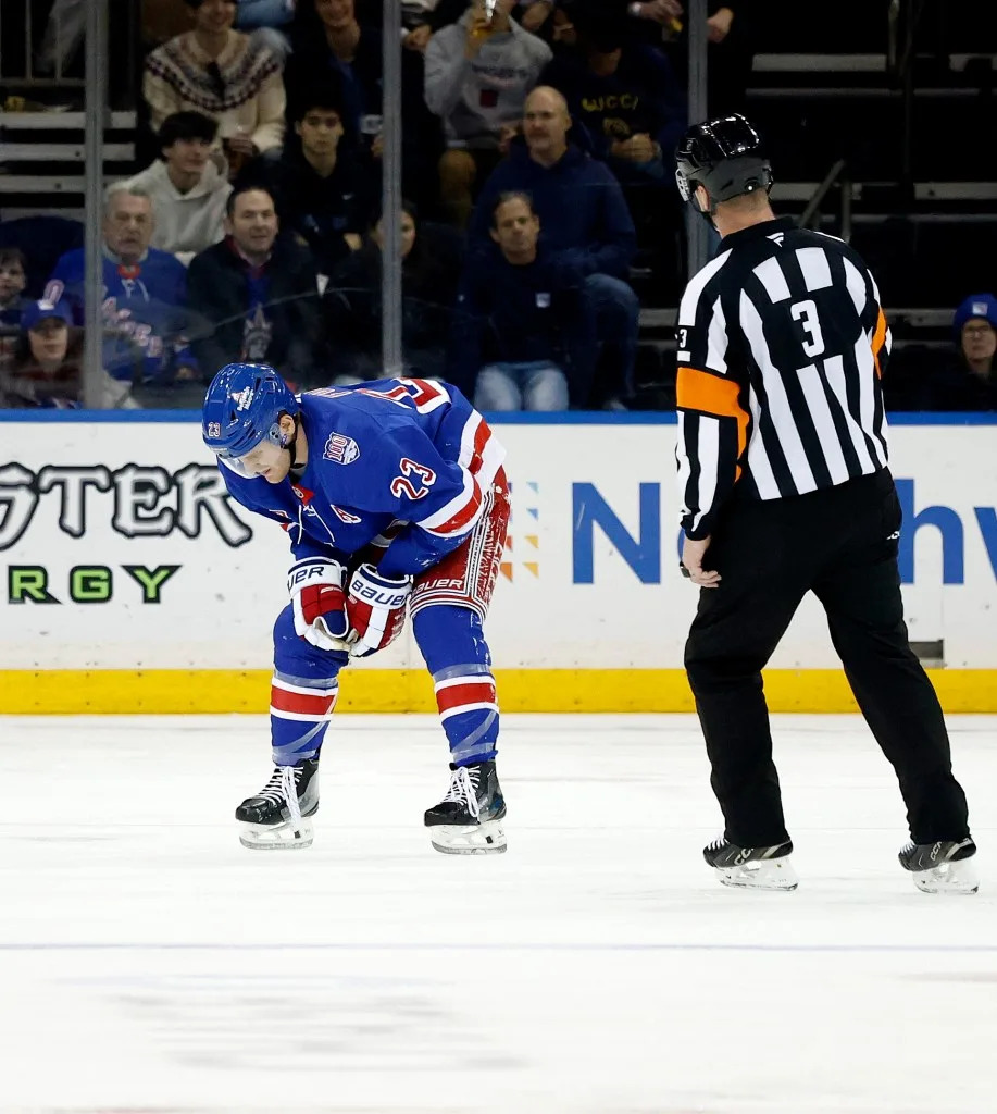 New York Rangers defenseman Adam Fox (23) reacts after taking a hit during the third period when the New York Rangers played the Tampa Bay Lightning Saturday, November 29, 2025 at Madison Square. Robert Sabo for NY Post