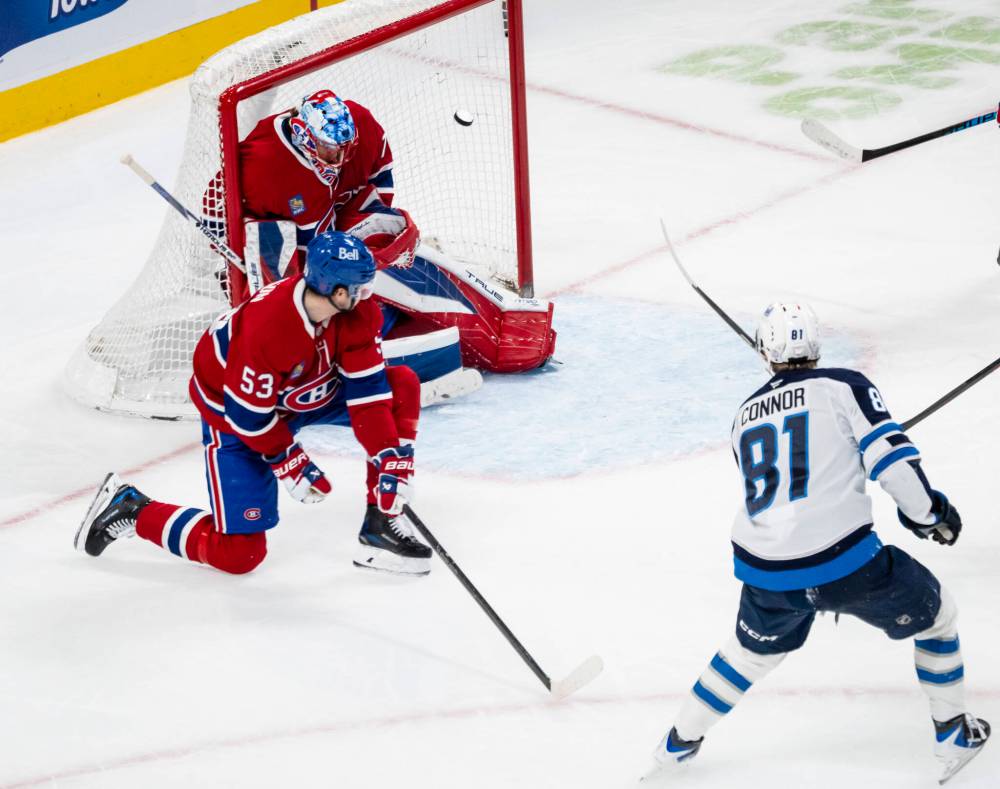 Christopher Katsarov / THE CANADIAN PRESS
Winnipeg Jets’ Kyle Connor scores on Montreal Canadiens goaltender Jakub Dobes while Noah Dobson defends, during the second period.