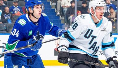 Vancouver Canucks forward Linus Karlsson, left, battles with Utah Mammoth defenceman Nate Schmidt during NHL action Friday, Dec. 5, 2025 at Rogers Arena in Vancouver. (https://x.com/Canucks photo)