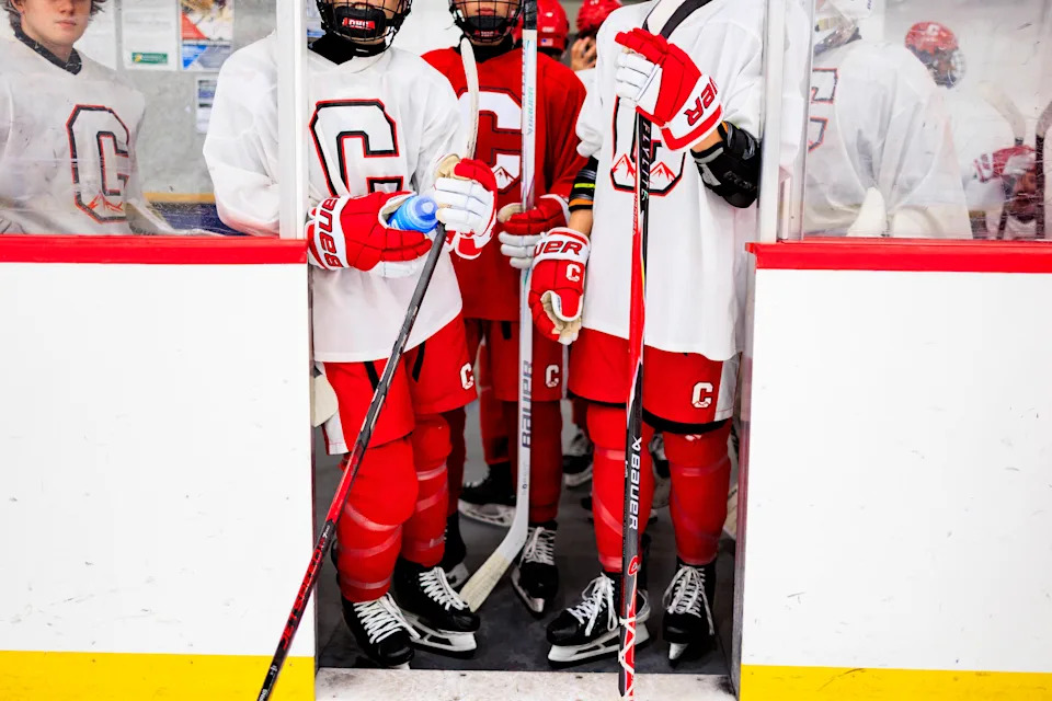 The Colorado Amateur Hockey Association threatened to discipline Brooke Wilfley's program, Okanagan Hockey Colorado, if she refused to comply with its demand to turn in her personal electronic devices for its investigation. Disciplinary action could have prevented the players on her team from competing.