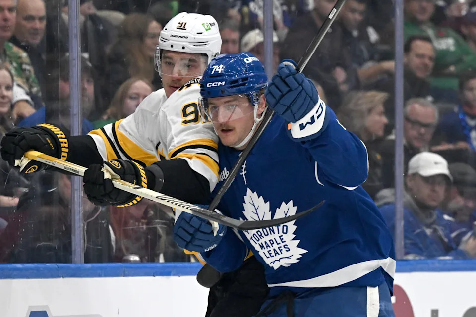 Toronto Maple Leafs forward Bobby McMann (74) battles on the boards.Dan Hamilton-Imagn Images