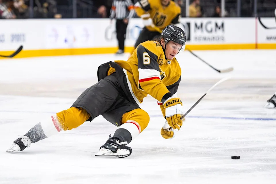 Vegas Golden Knights defenseman Kaedan Korczak (6) slips while skating with the puck during a NHL game between the Vegas Golden Knights and the Chicago Blackhawks, Tuesday December 2, 2025 in Las Vegas, Nev.