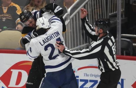 Scott Laughton goes after Evgeni Malkin, after the Pens star targeted the Leafs forward's head in a 7-2 Leafs win in Pittsburgh