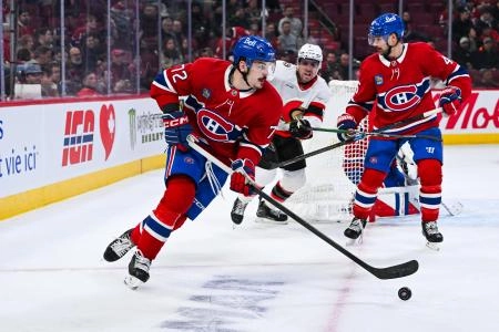 Dec 2, 2025; Montreal, Quebec, CAN; Montreal Canadiens defenseman Arber Xhekaj (72) skates away with the puck against the Ottawa Senators during the third period at Bell Centre.