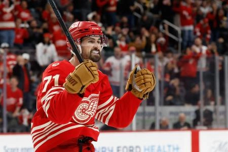 Dec 2, 2025; Detroit, Michigan, USA; Detroit Red Wings center Dylan Larkin (71) celebrates a goal by defenseman Ben Chiarot (not pictured) in the second period against the Boston Bruins at Little Caesars Arena. Dec 2, 2025; Detroit, Michigan, USA; Detroit Red Wings center Dylan Larkin (71) celebrates a goal by defenseman Ben Chiarot (not pictured) in the second period against the Boston Bruins at Little Caesars Arena.