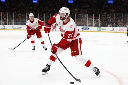 Nov 29, 2025; Boston, Massachusetts, USA; Detroit Red Wings center Michael Rasmussen (27) lets go with a shot during overtime against the Boston Bruins at TD Garden. Mandatory Credit: Winslow Townson-Imagn Images Nov 29, 2025; Boston, Massachusetts, USA; Detroit Red Wings center Michael Rasmussen (27) lets go with a shot during overtime against the Boston Bruins at TD Garden. Mandatory Credit: Winslow Townson-Imagn Images