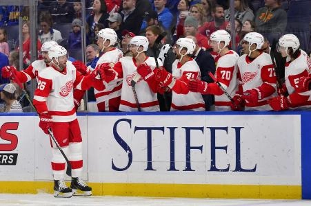 Mar 21, 2019; St. Louis, MO, USA; Detroit Red Wings left wing Thomas Vanek (26) is congratulated by teammates after scoring during the first period against the St. Louis Blues at Enterprise Center. Mar 21, 2019; St. Louis, MO, USA; Detroit Red Wings left wing Thomas Vanek (26) is congratulated by teammates after scoring during the first period against the St. Louis Blues at Enterprise Center.