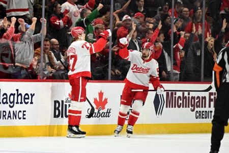 Mar 12, 2025; Detroit, Michigan, USA; Detroit Red Wings defenseman Simon Edvinsson (77) celebrates with defenseman Erik Gustafsson (56) after scoring a goal against the Buffalo Sabres in the first period at Little Caesars Arena. Mar 12, 2025; Detroit, Michigan, USA; Detroit Red Wings defenseman Simon Edvinsson (77) celebrates with defenseman Erik Gustafsson (56) after scoring a goal against the Buffalo Sabres in the first period at Little Caesars Arena.