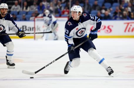 Dec 5, 2024; Buffalo, New York, USA; Winnipeg Jets center Brad Lambert (93) looks to make a pass during the first period against the Buffalo Sabres at KeyBank Center. Mandatory Credit: Timothy T. Ludwig-Imagn Images Dec 5, 2024; Buffalo, New York, USA; Winnipeg Jets center Brad Lambert (93) looks to make a pass during the first period against the Buffalo Sabres at KeyBank Center. Mandatory Credit: Timothy T. Ludwig-Imagn Images