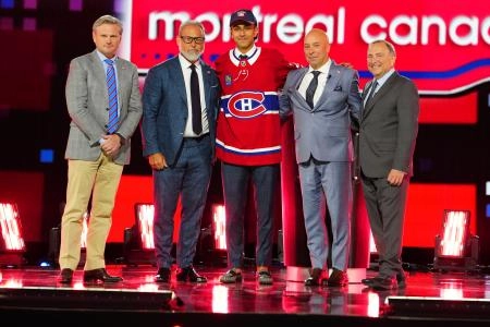 Jun 28, 2024; Las Vegas, Nevada, USA; Michael Hage is selected by the Montreal Canadiens with the 21st overall pick in the first round of the 2024 NHL Draft at The Sphere. Mandatory Credit: Stephen R. Sylvanie-Imagn Images Jun 28, 2024; Las Vegas, Nevada, USA; Michael Hage is selected by the Montreal Canadiens with the 21st overall pick in the first round of the 2024 NHL Draft at The Sphere. Mandatory Credit: Stephen R. Sylvanie-Imagn Images
