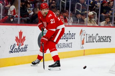 Oct 25, 2025; Detroit, Michigan, USA; Detroit Red Wings left wing James van Riemsdyk (21) skates with the puck in the second period against the St. Louis Blues at Little Caesars Arena. Oct 25, 2025; Detroit, Michigan, USA; Detroit Red Wings left wing James van Riemsdyk (21) skates with the puck in the second period against the St. Louis Blues at Little Caesars Arena.