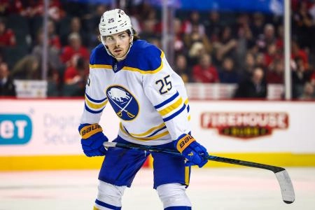 Dec 8, 2025; Calgary, Alberta, CAN; Buffalo Sabres defenseman Owen Power (25) against the Calgary Flames during the first period at Scotiabank Saddledome. Mandatory Credit: Sergei Belski-Imagn Images