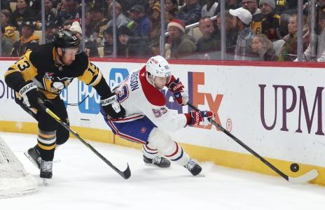 Dec 21, 2025; Pittsburgh, Pennsylvania, USA; Montreal Canadiens defenseman Noah Dobson (53) moves the puck against Pittsburgh Penguins right wing Kevin Hayes (13) during the first period at PPG Paints Arena. Mandatory Credit: Charles LeClaire-Imagn Images