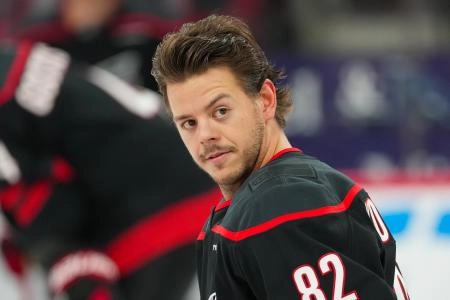 Dec 6, 2025; Raleigh, North Carolina, USA; Carolina Hurricanes center Jesperi Kotkaniemi (82) looks on during the warmups before the game against the Nashville Predators at Lenovo Center. Mandatory Credit: James Guillory-Imagn Images