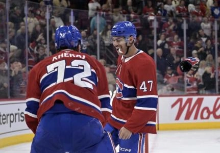 Nov 22, 2025; Montreal, Quebec, CAN; Montreal Canadiens defenseman Arber Xhekaj (72) and teammate defenseman Jayden Struble (47) celebrate the win against the Toronto Maple Leafs at the Bell Centre. Mandatory Credit: Eric Bolte-Imagn Images