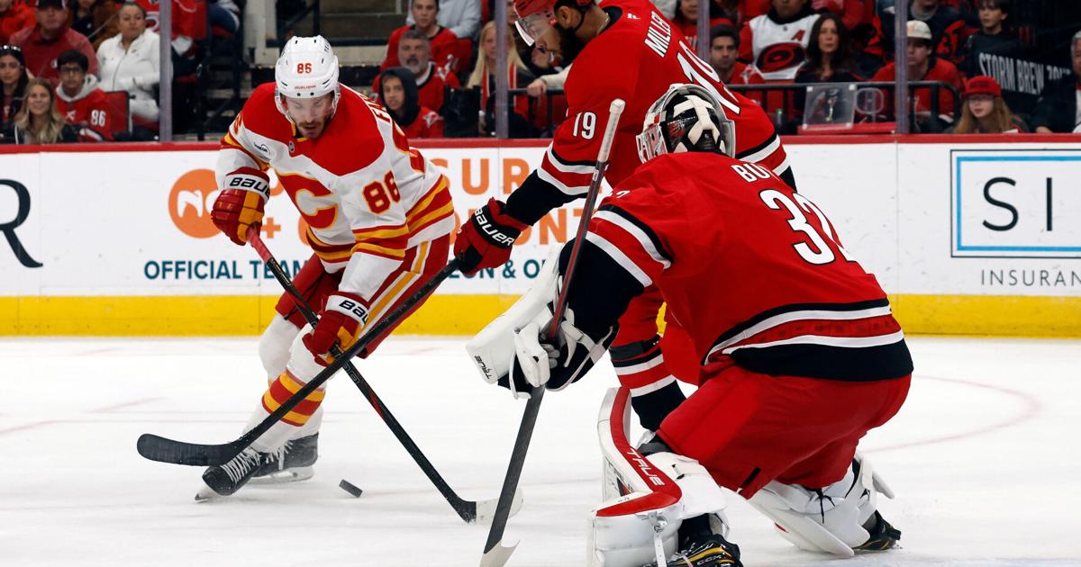 Bussi makes 15 saves for 1st NHL shutout, Ehlers scores in OT in Hurricanes' 1-0 win over Flames | National Sports