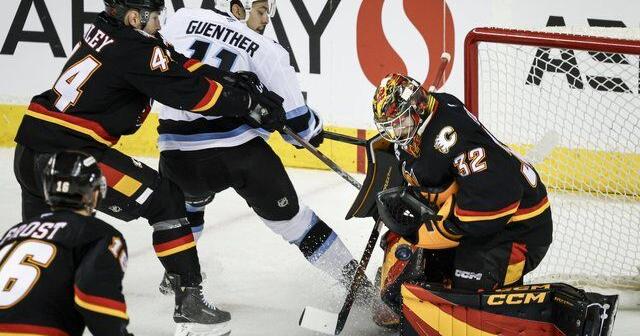 Wolf's 28-save shutout leads Calgary Flames to 2-0 win over Utah Mammoth | National Sports
