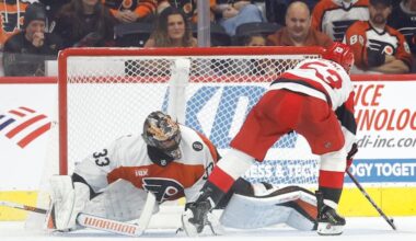 Flyers goaltender Samuel Ersson attempts to stop Carolina Hurricanes right wing Jackson Blake’s shootout game-winning goal on Saturday.
