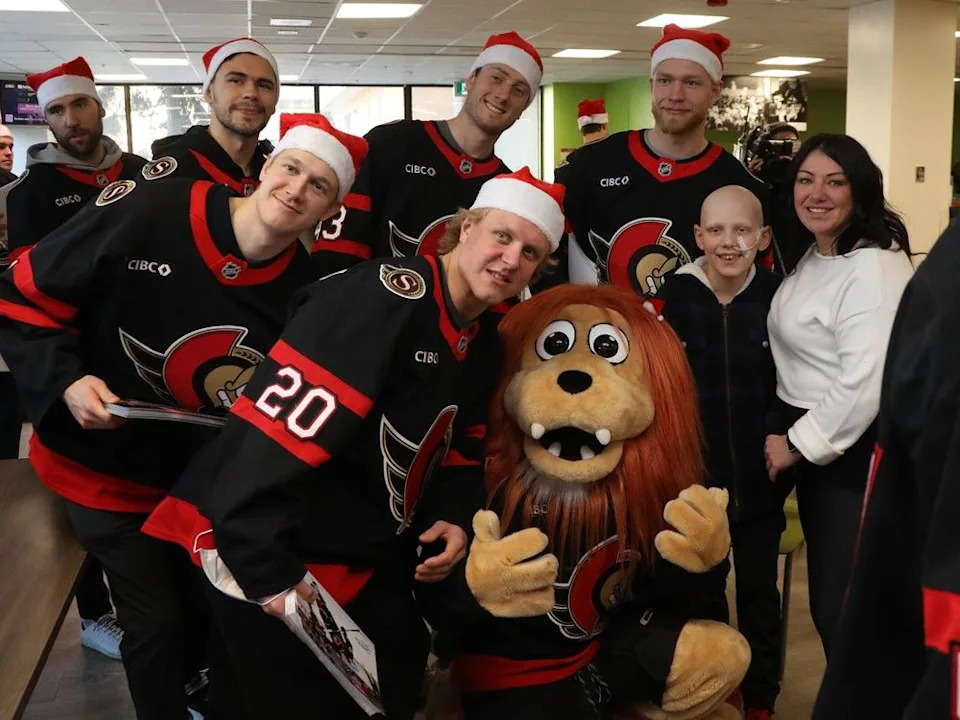  Preston Renaud, 11 years old, is photographed with the Ottawa Senators during their annual their annual trip to the Children’s Hospital of Eastern Ontario (CHEO) to spread festive cheer, December 08, 2025.