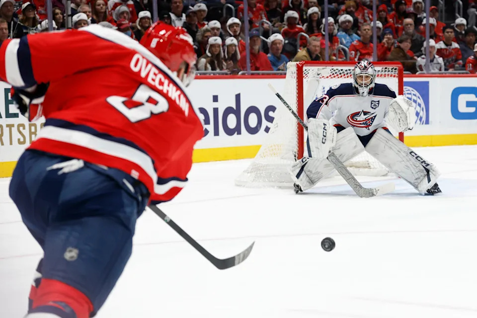 Dec 7, 2025; Washington, District of Columbia, USA; Columbus Blue Jackets goaltender Jet Greaves (73) prepares to make a save on Washington Capitals left wing Alex Ovechkin (8) during the first period at Capital One Arena. Mandatory Credit: Geoff Burke-Imagn Images