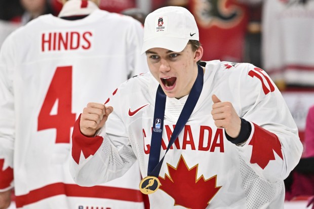 Connor Bedard of Team Canada celebrates after receiving his gold medal at the 2023 IIHF World Junior Championship on Jan. 5, 2023, in Halifax, Nova Scotia. (Minas Panagiotakis/TNS)