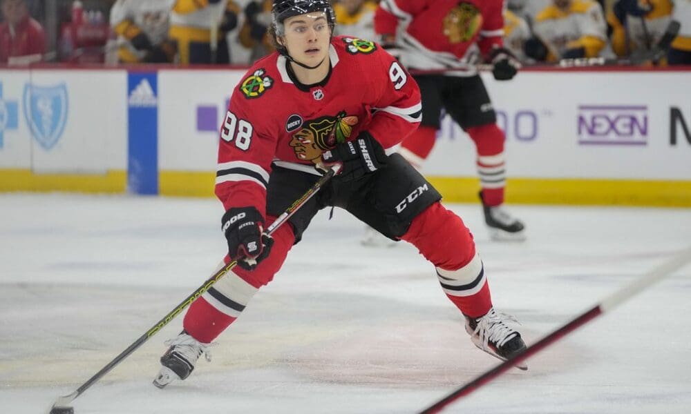 Chicago Blackhawks center Connor Bedard handles the puck during the second period an NHL hockey game against the Nashville Predators Tuesday, Dec. 5, 2023, in Chicago. (AP Photo/Erin Hooley)
