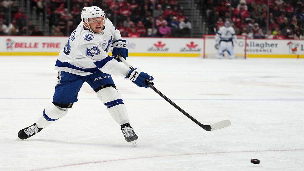 Tampa Bay Lightning defenseman Darren Raddysh shoots during the second period of an NHL hockey game against the Detroit Red Wings Friday, Nov. 28, 2025, in Detroit. (AP Photo/Ryan Sun)
