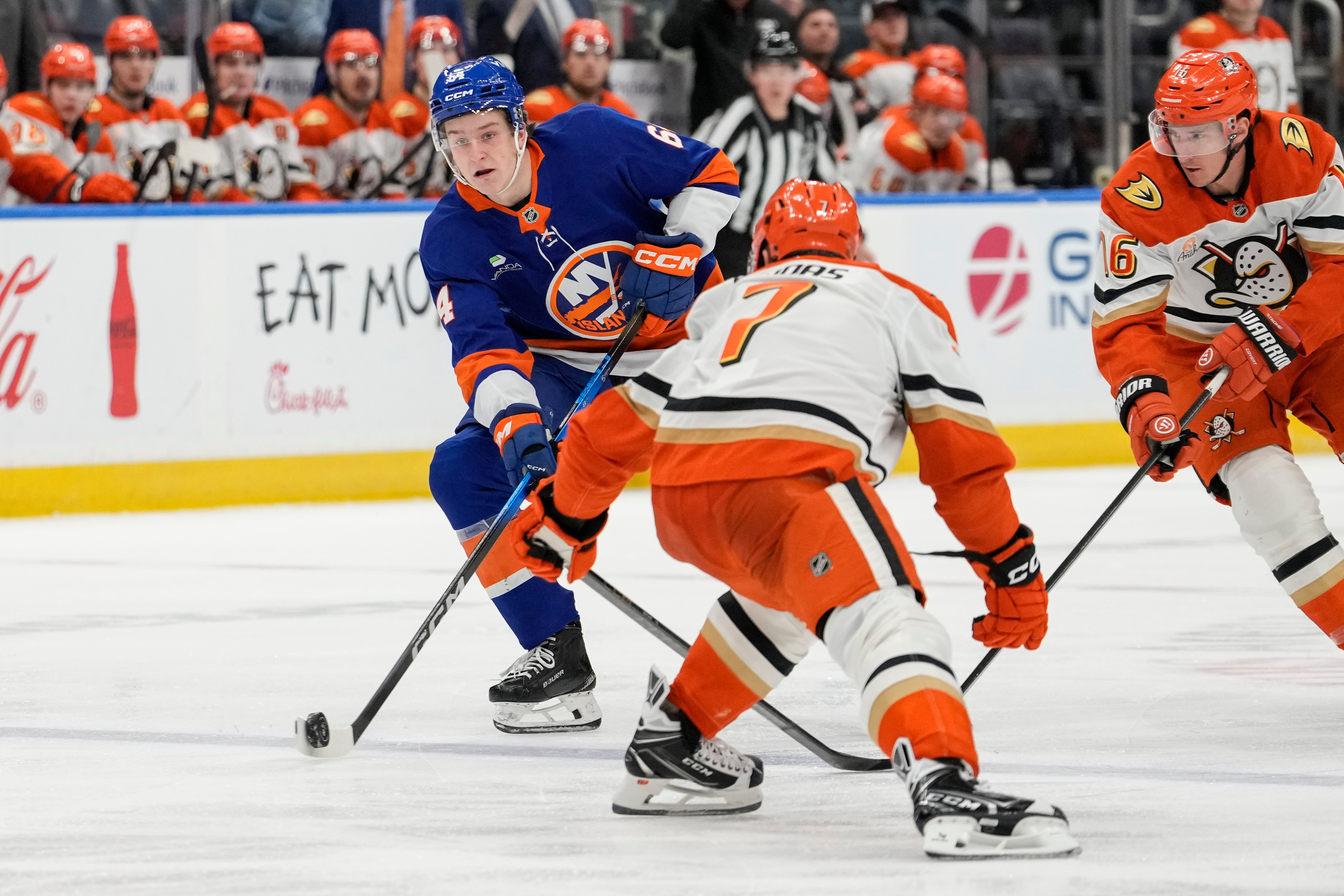 New York Islanders center Calum Ritchie (64) looks to pass the...