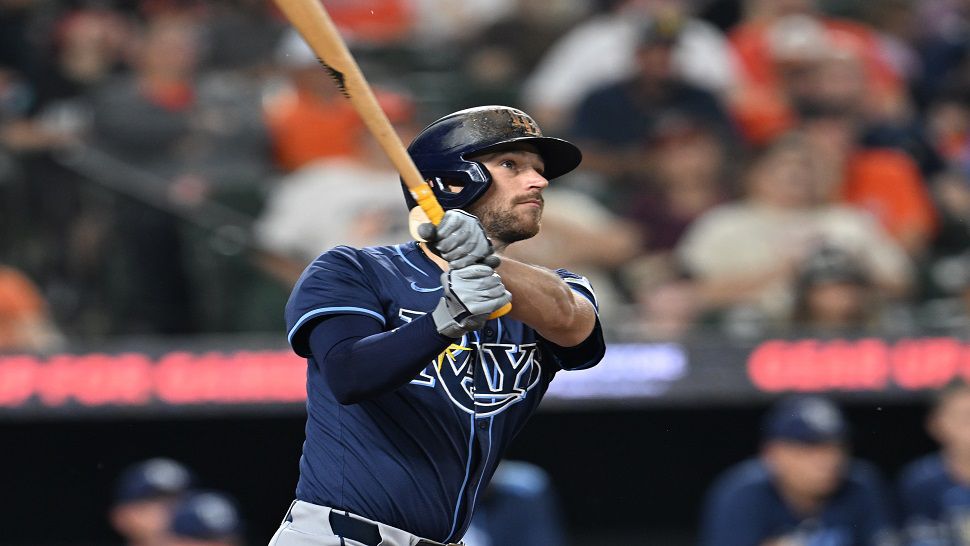 Tampa Bay Rays Brandon Lowe follows through on a solo home run against the Baltimore Orioles in the third inning of a baseball game, Wednesday, Sept. 24, 2025, in Baltimore. (AP Photo/Gail Burton, File)