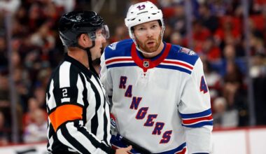 New York Rangers' Vladislav Gavrikov gets an explanation from an official during the second period of an NHL hockey game against the Carolina Hurricanes in Raleigh, N.C., Wednesday, Nov. 26, 2025. (AP Photo/Karl DeBlaker)