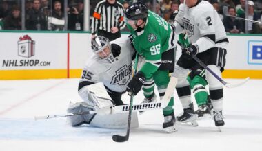 Los Angeles Kings goaltender Darcy Kuemper, left, collides with Dallas Stars right wing Mikko Rantanen during the first period of an NHL hockey game Monday, Dec. 15, 2025, in Dallas. (AP Photo/Julio Cortez)
