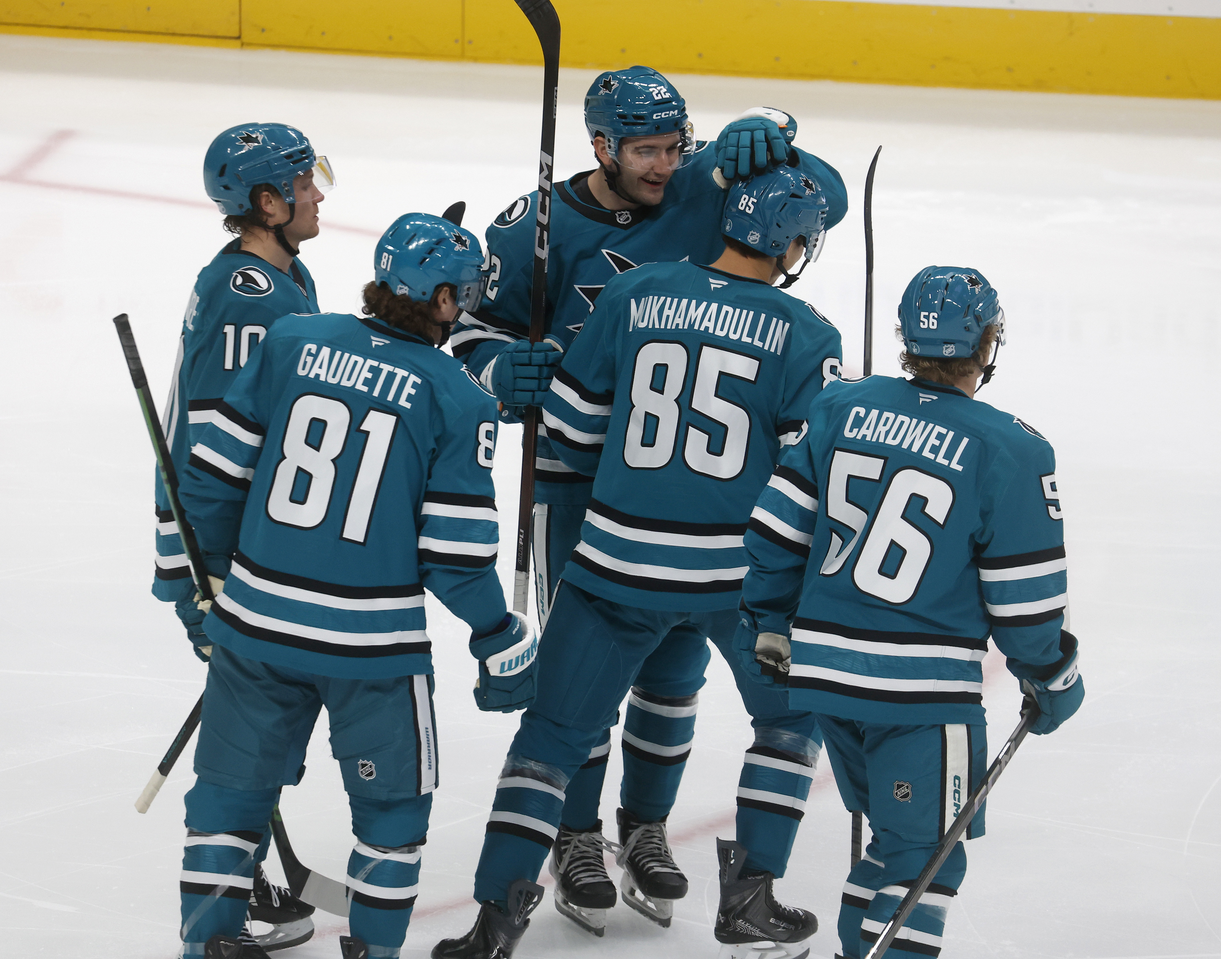 San Jose Sharks' Shakir Mukhamadullin (85) is congratulated by San...